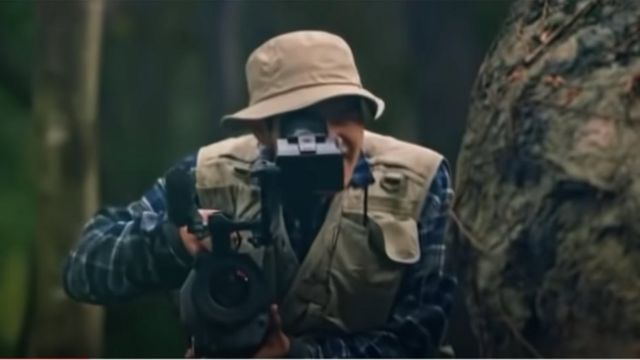 A scene from an advertisement for Seoul Milk. The 52-second video begins as a male explorer with a camera wanders through the mountains.