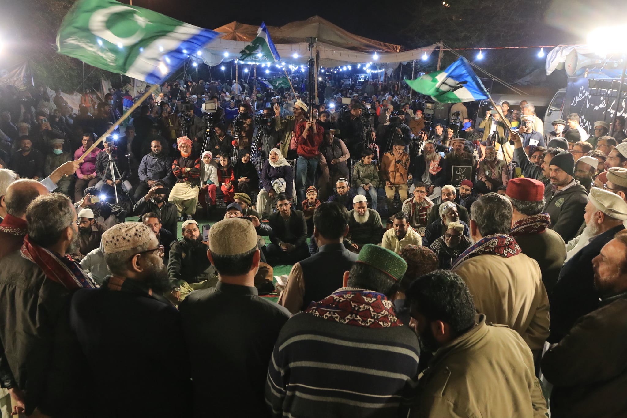 May be an image of one or more people, people standing, crowd and outdoors