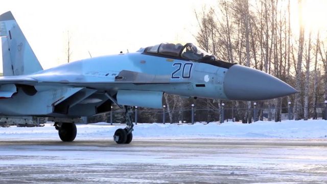 Caption: Su-35 warplane prepares to take off for joint military exercises with Belarus