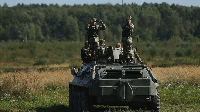 Ukrainian soldiers stand on an armoured personnel carrier during a two-week exercise involving the US, Nato and non-Nato troops near Yavorov, Ukraine, on 16 September 2014.