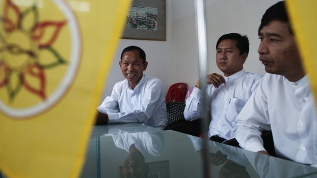 Ko Jimmy with two other 88 leaders in Yangon in 2014