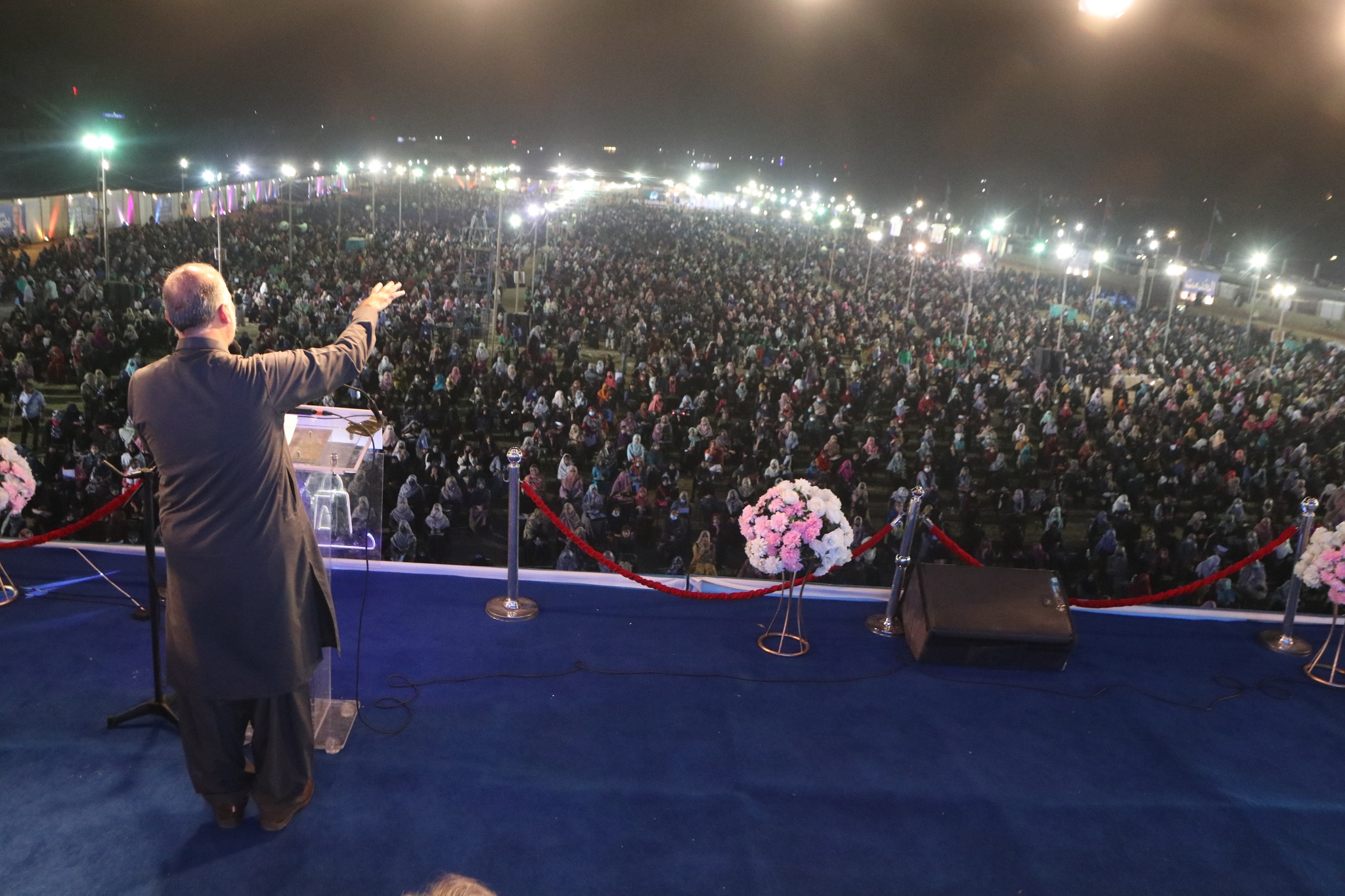 May be an image of 1 person, standing and crowd