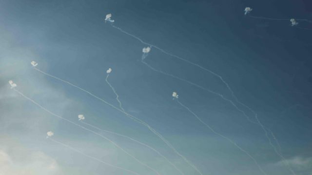 Israel's Iron Dome anti-missile system intercepts rockets launched from the Gaza Strip, as seen from near Sderot in southern Israel on Tuesday 10 October 2023